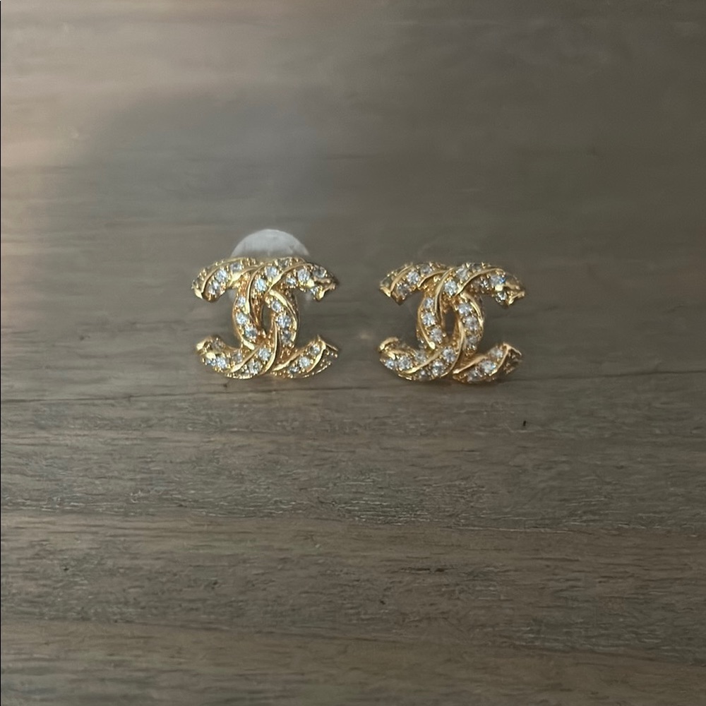 CHANEL Gold Logo Stud Earrings with Crystal Embellishments